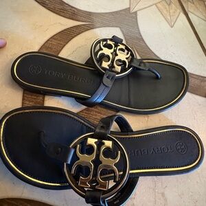 Tory Burch Black Sandals with Gold Detailing